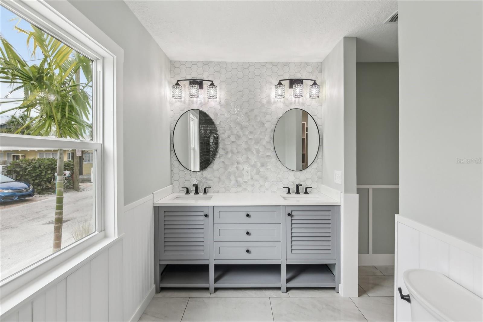 Gorgeous shower with built-in seat.  You can choose how to customize it from here.