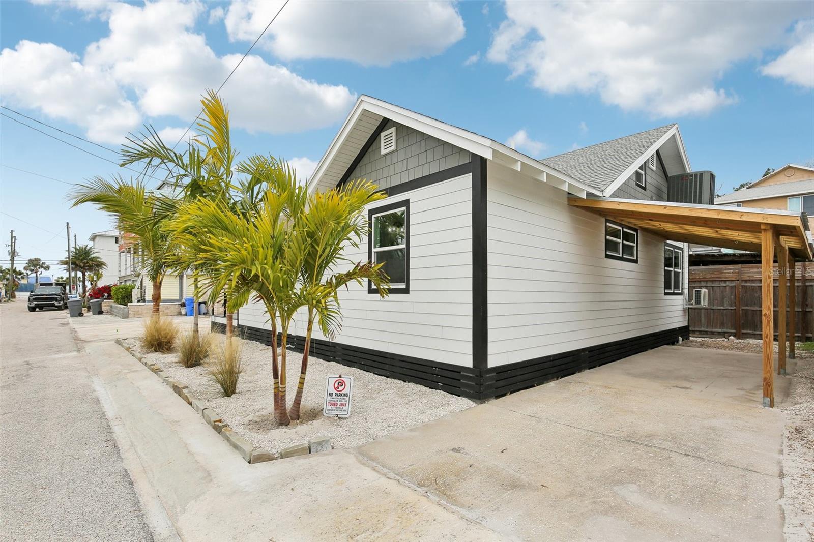 Carport on the east side of the house with room to park 2 vehicles.