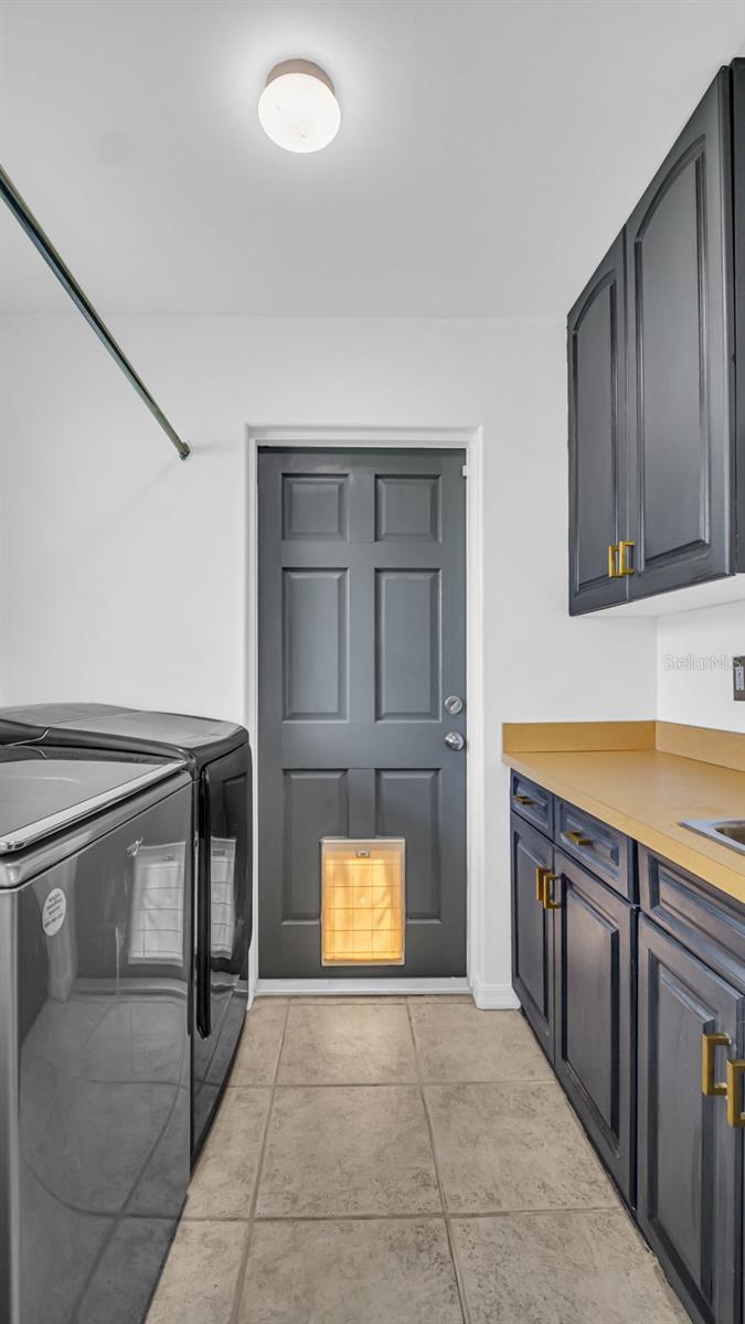 Laundry room with storage