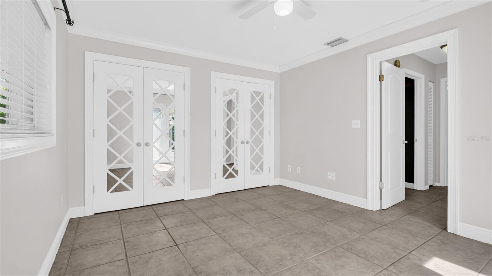 Guest bedroom with French doors