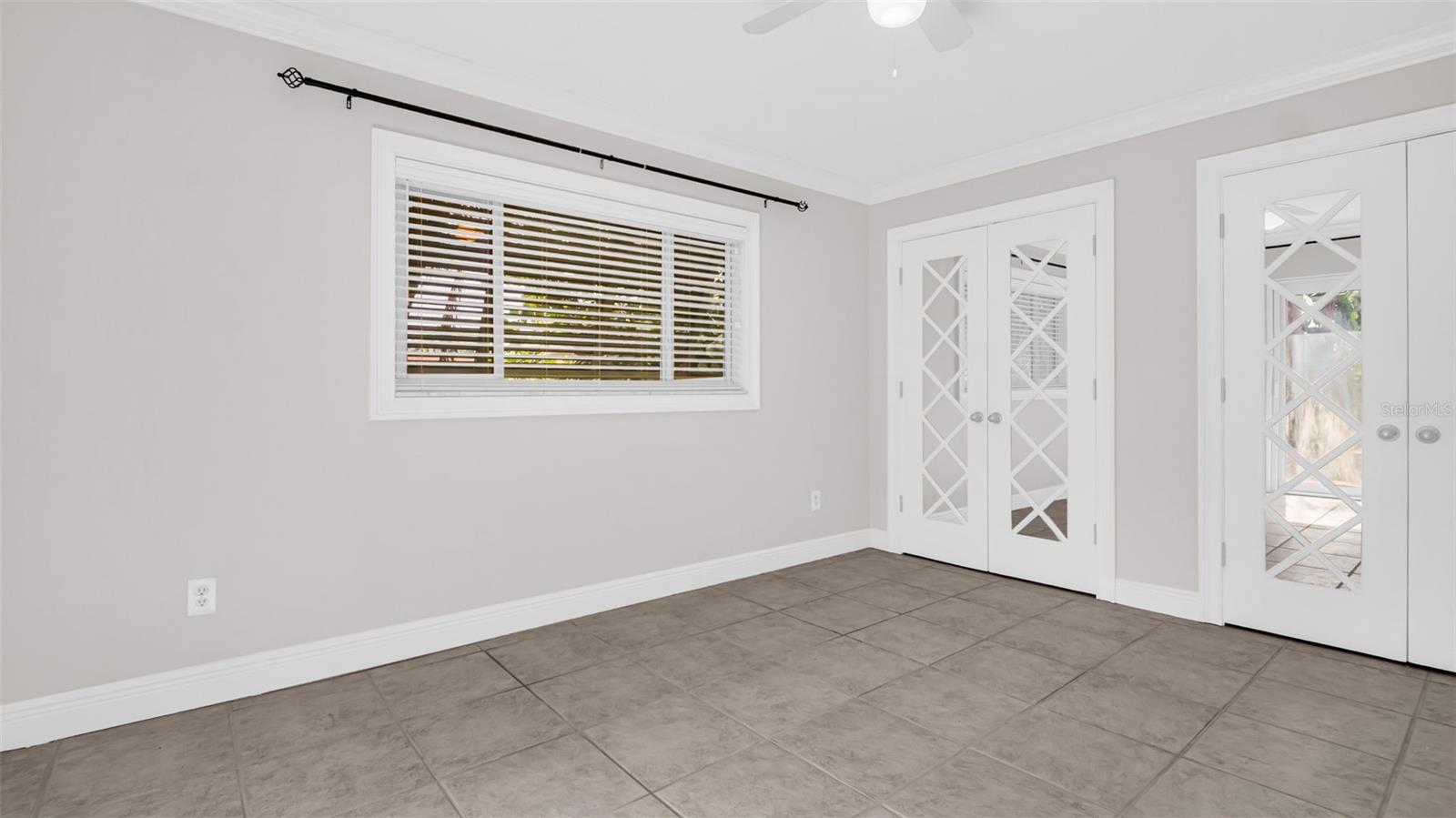 Guest bedroom with French doors