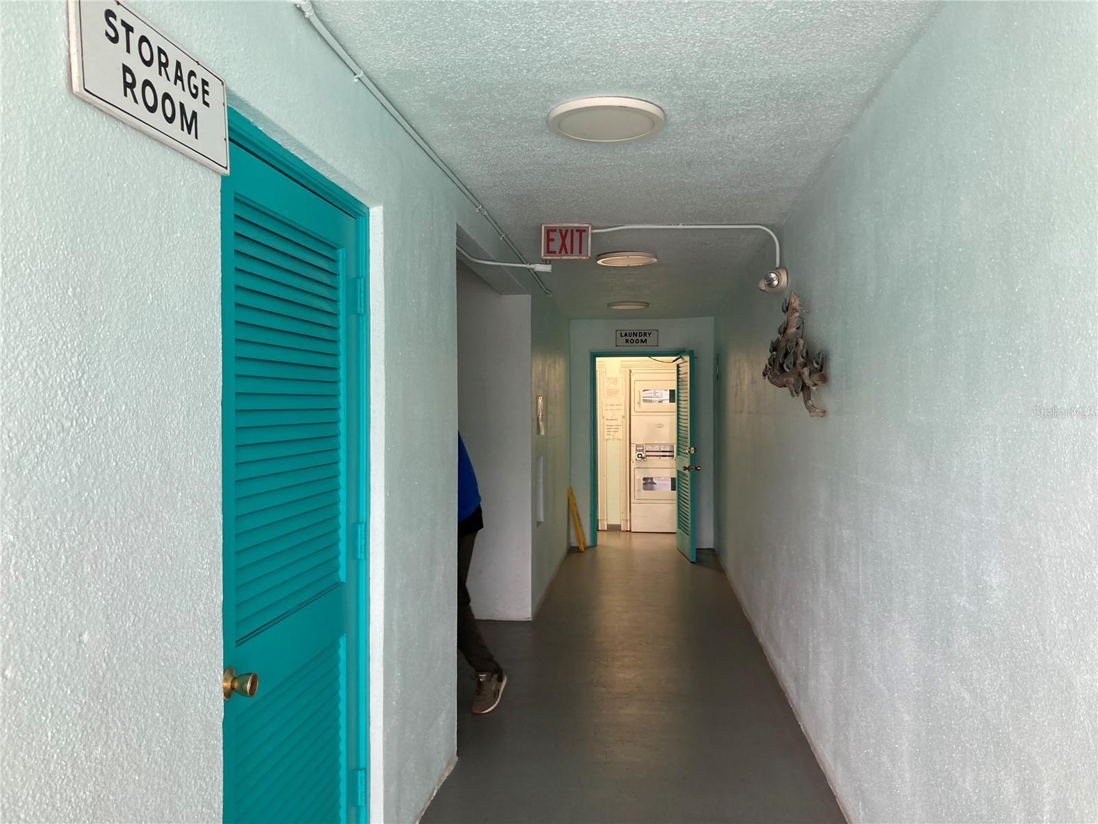 Storage and laundry rooms just steps away on the same floor.