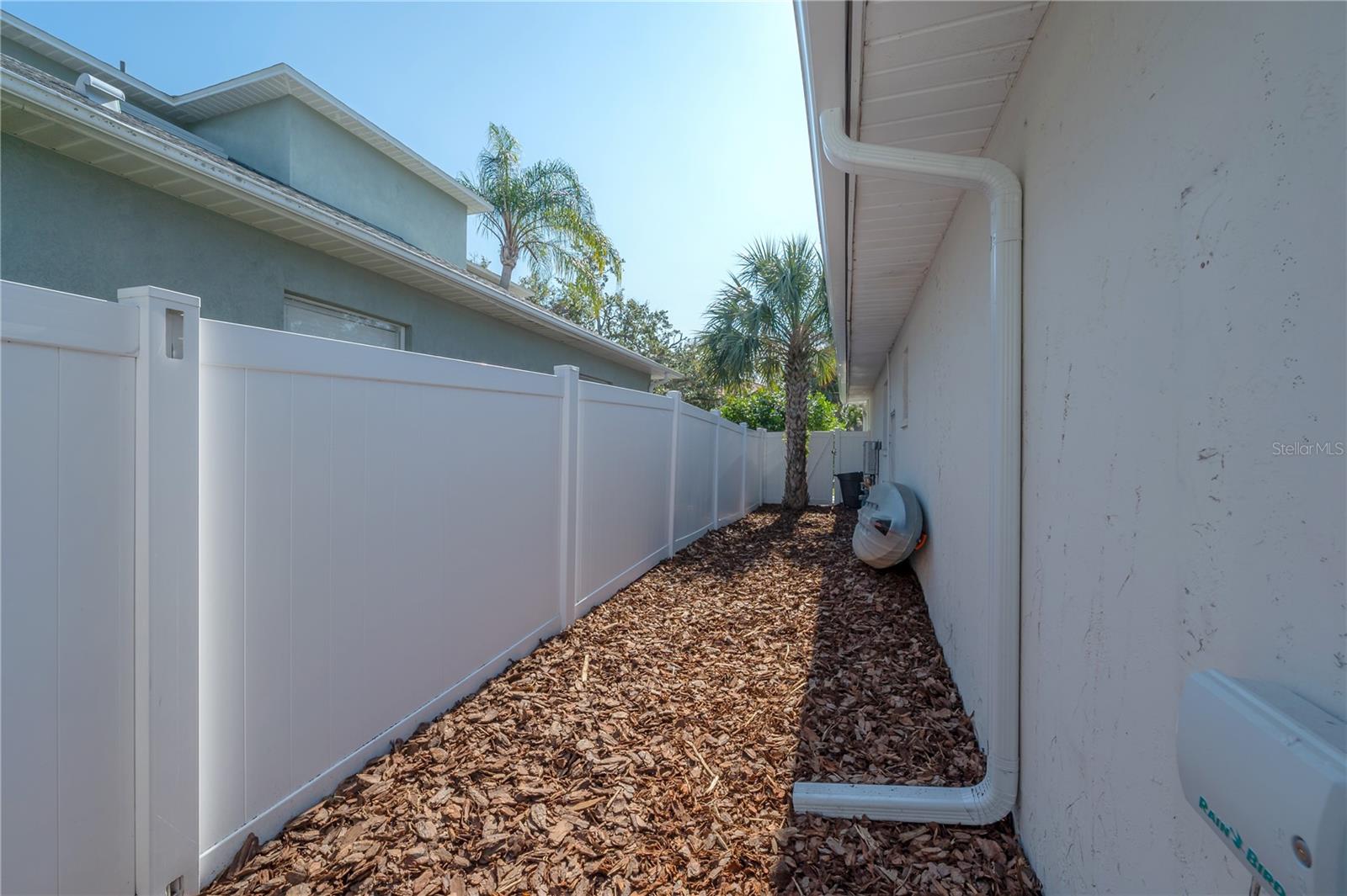 CarPort leading to back yard