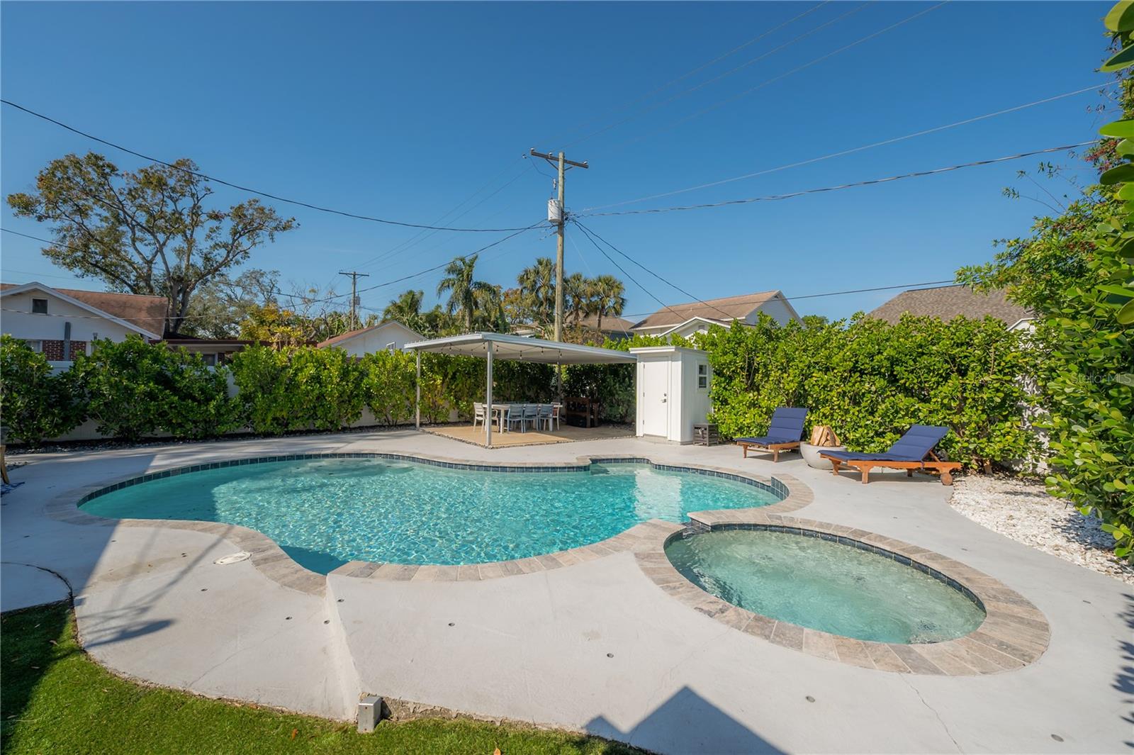 Saltwater Spa and Pool with- Child Safety Fence (removable, not shown) Cabana area and Freestanding half pool bath.