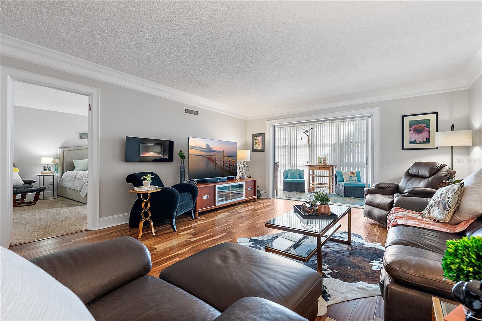 Look at the natural light flowing in from the sunroom