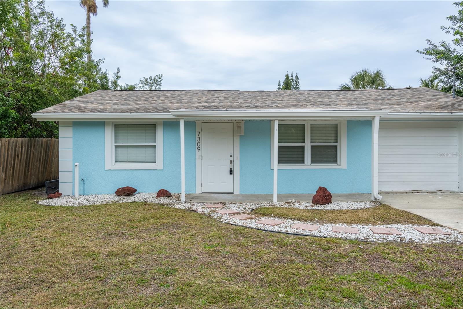 Front view of the home and it faces South