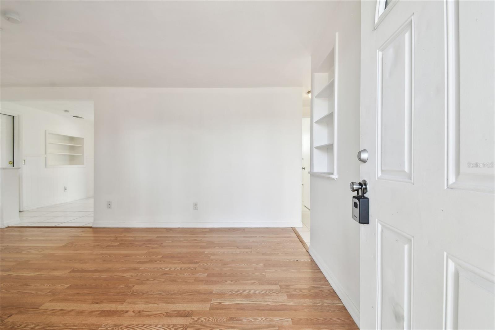 Entryway into living room - all new flooring and paint