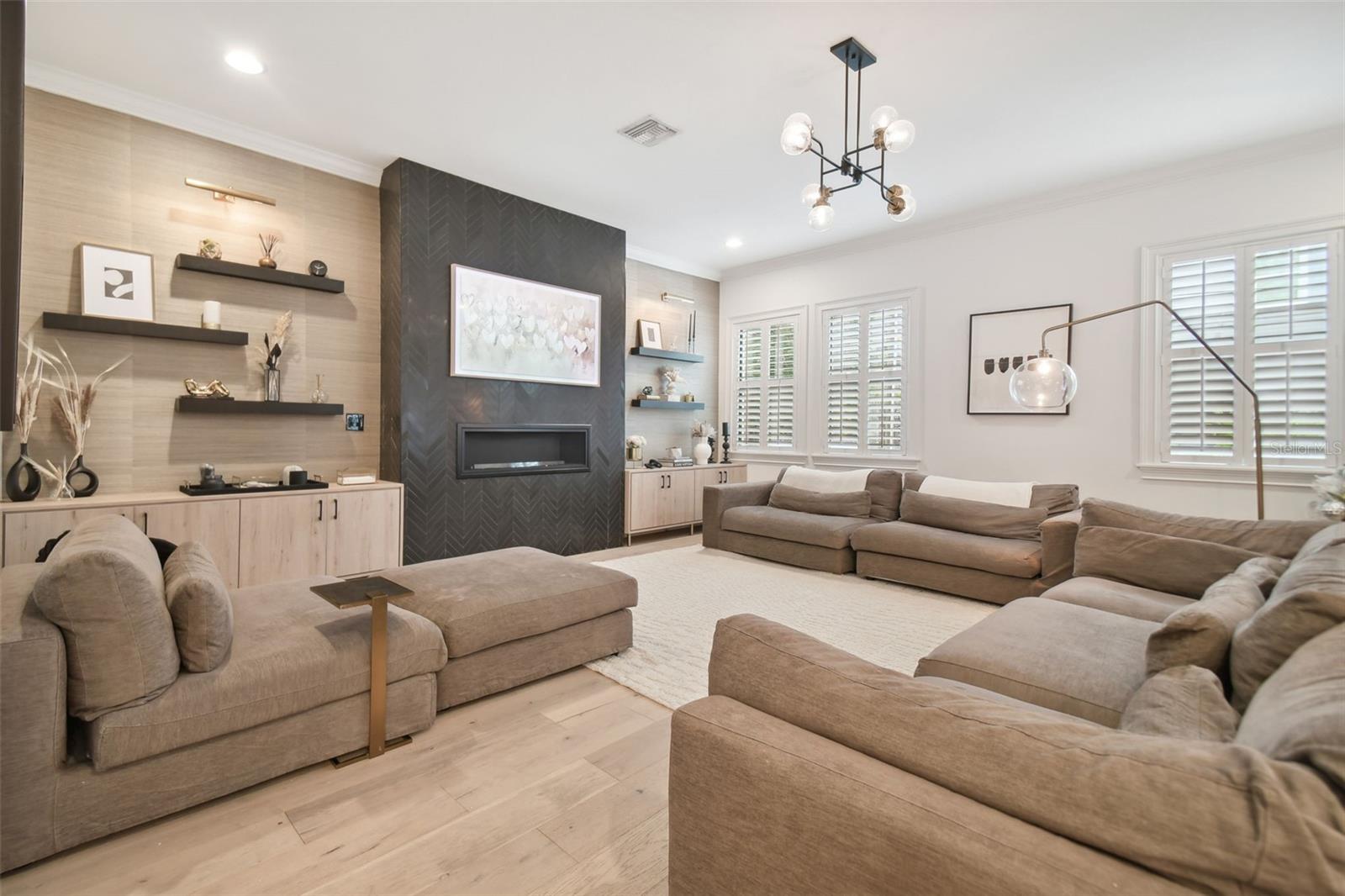 Living Room with Built in Electric Fireplace and shelves