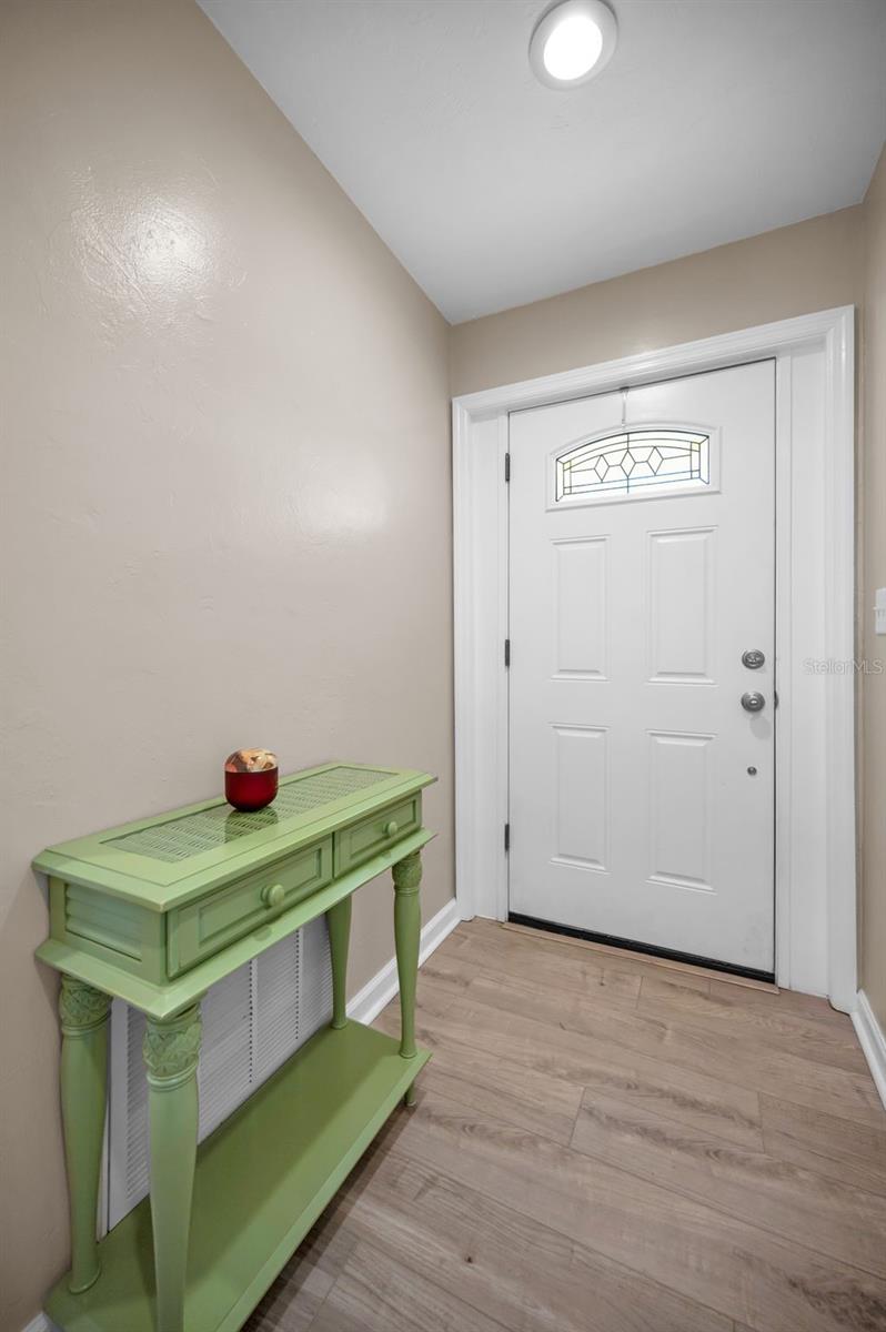 FOYER ENTRANCE, NO CARPET HERE!  LUXURY VINYL TILE FLOORING THROUGHOUT ENTIRE HOME!