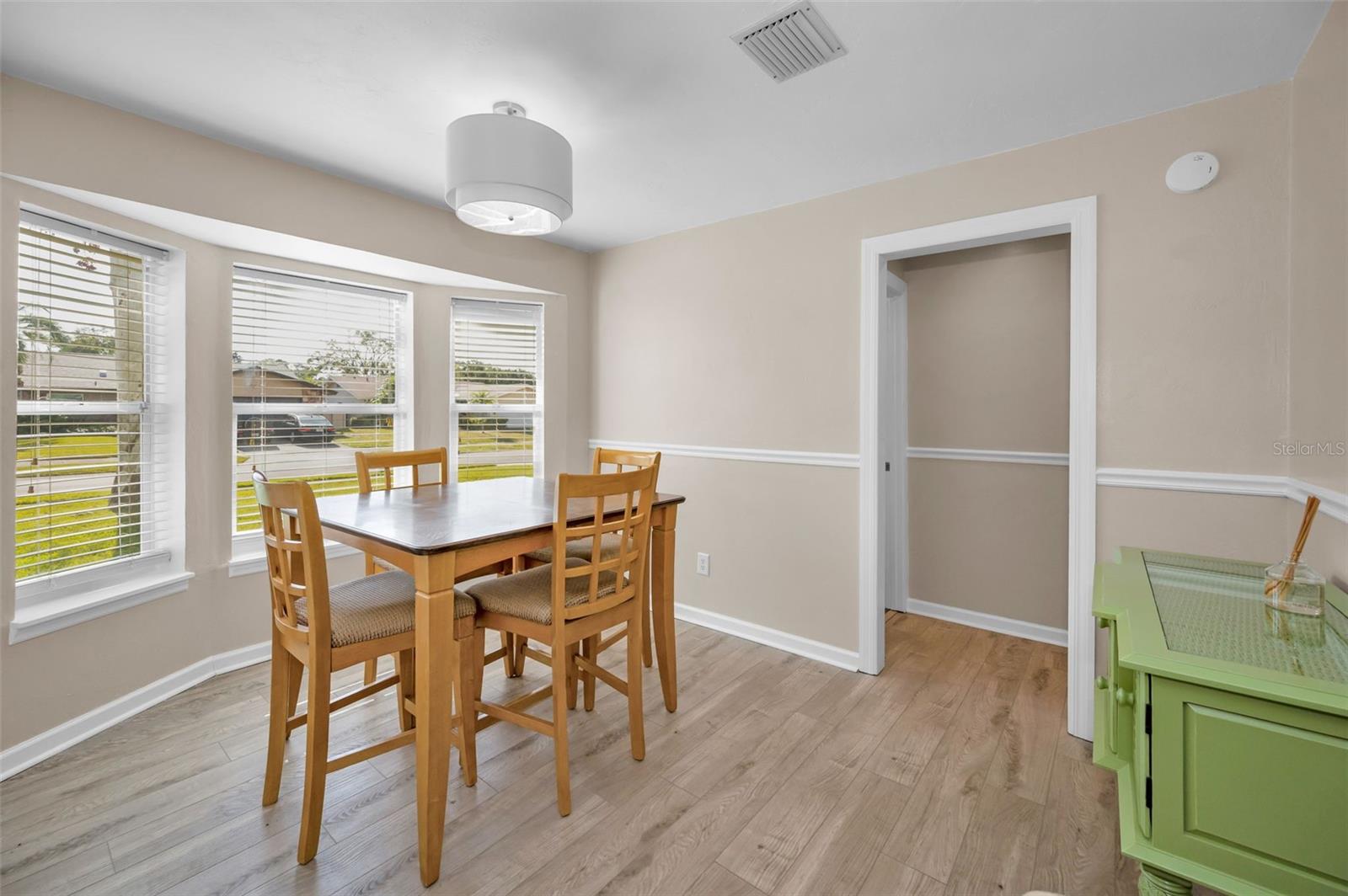 DINING ROOM WITH BAY WINDOW