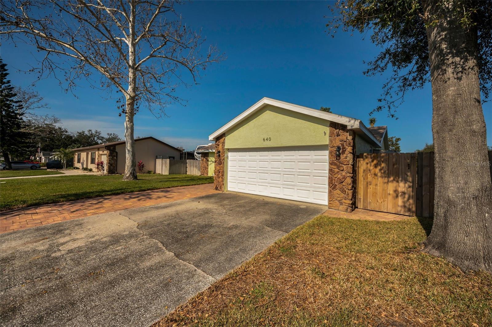 TWO CAR GARAGE, WITH WASHER/DRYER, MUD SINK AND LOTS OF STORAGE