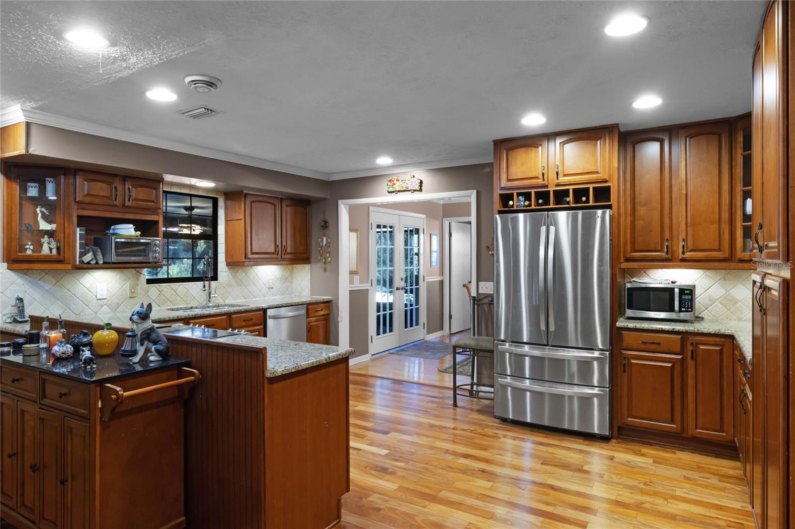 Gleaming gourmet kitchen with stainless appliances