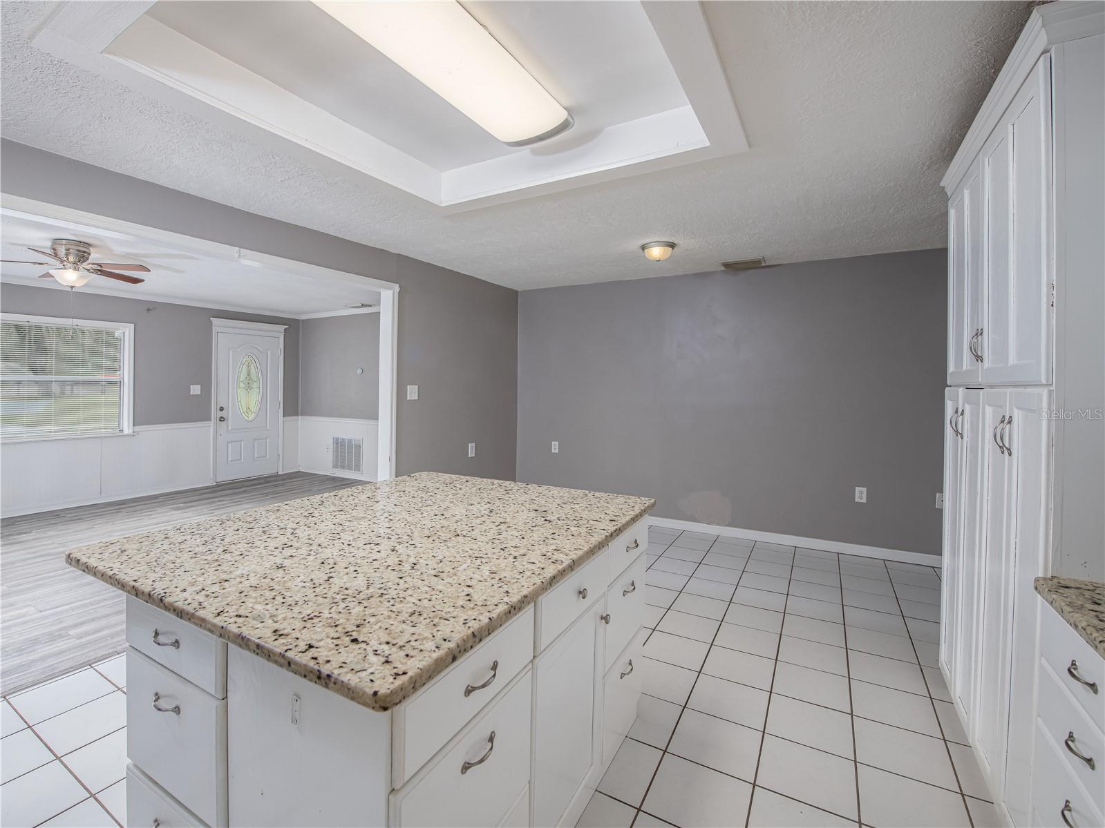 Kitchen can accommodate a dinette set or dining room table