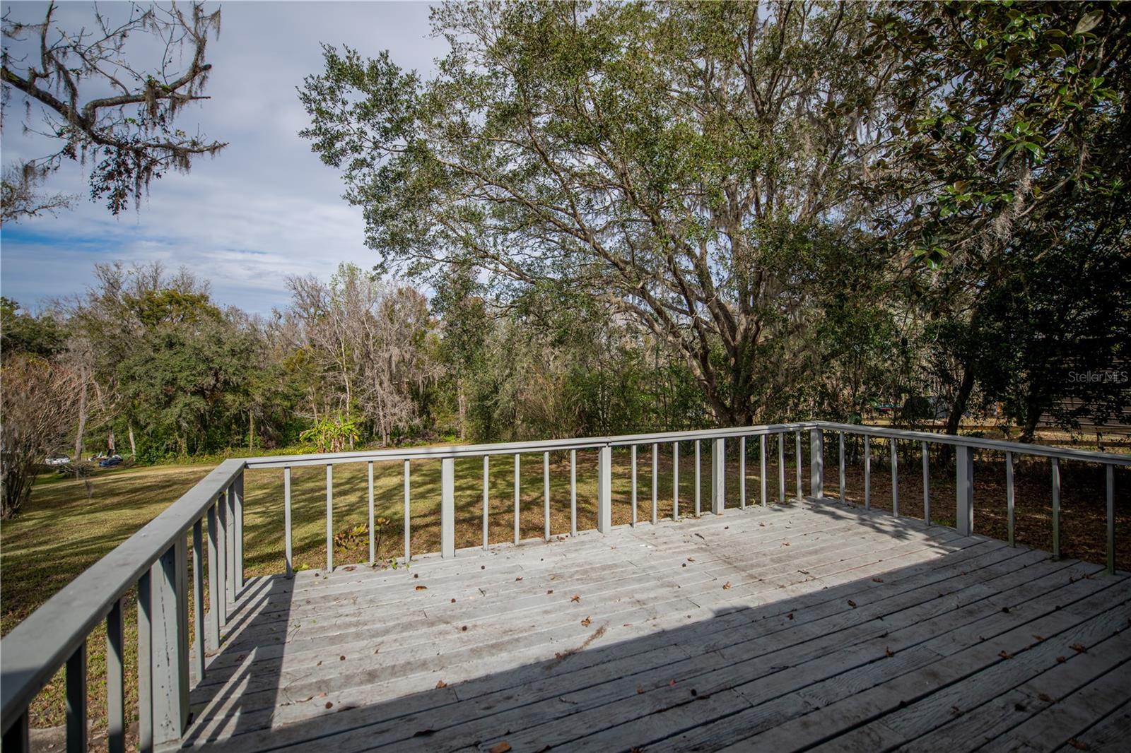 Rear deck overlooking LARGE backyard