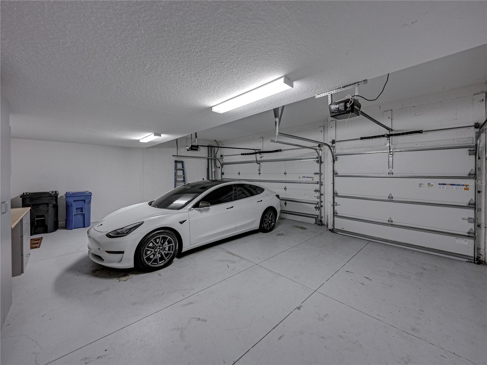 Massive, TRUE, 3 car garage.