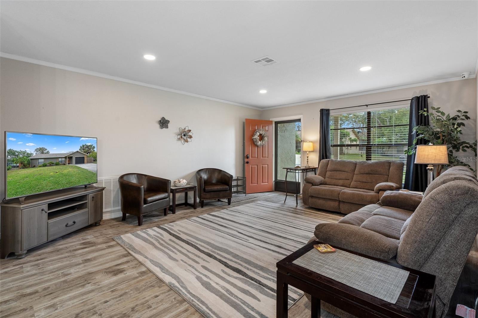 Spacious Living Room with Laminate Flooring