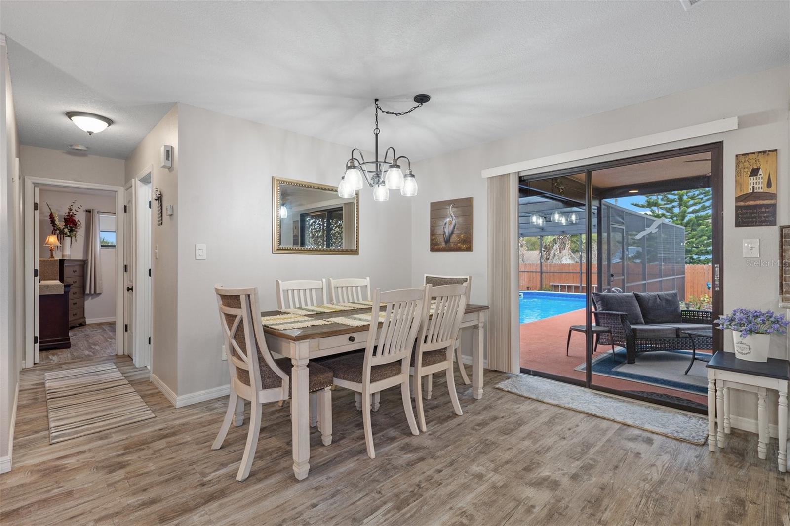 Dining Area with Sliders to Lanai and Pool