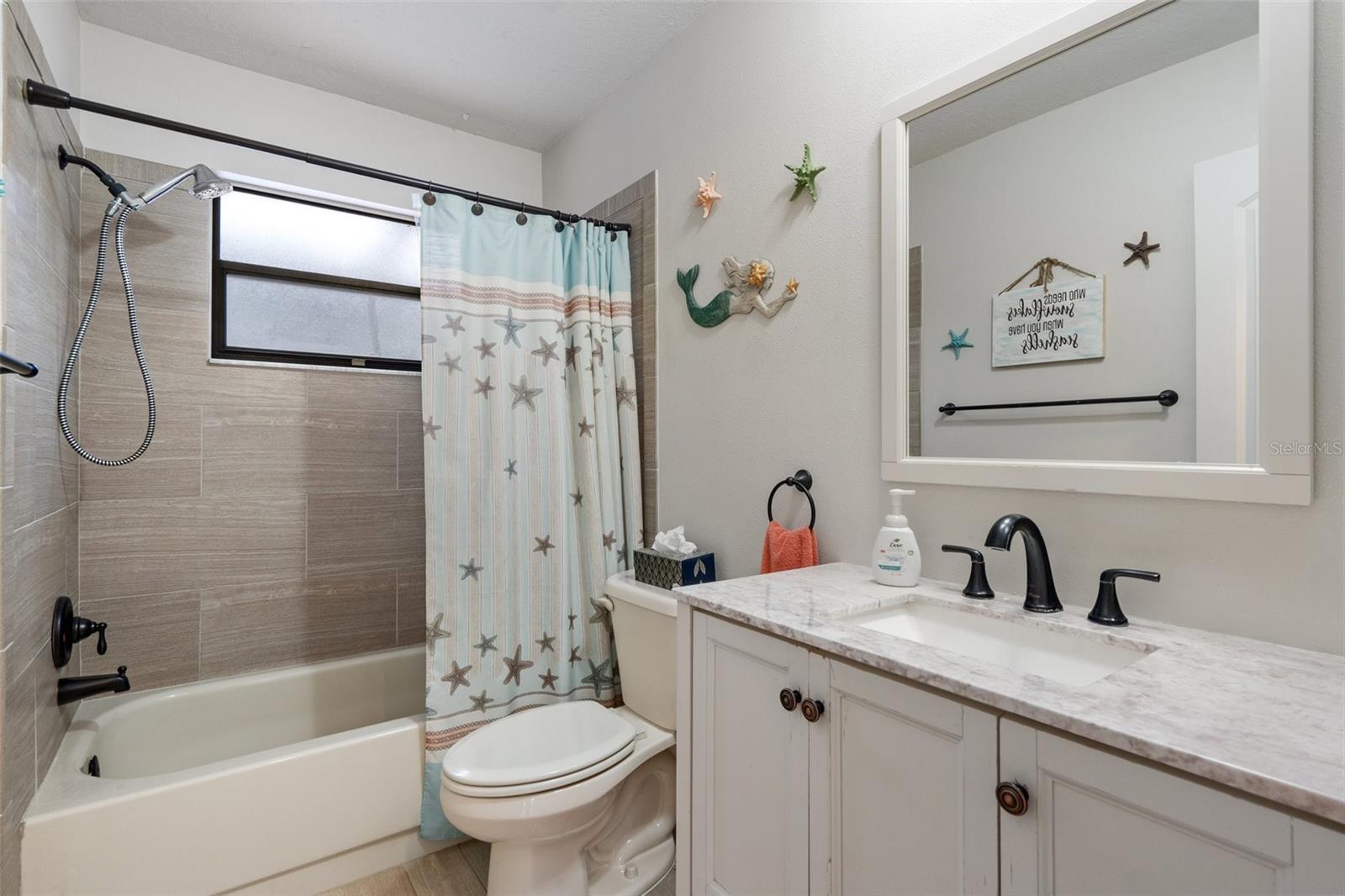 Updated Guest Bath with Tiled Tub