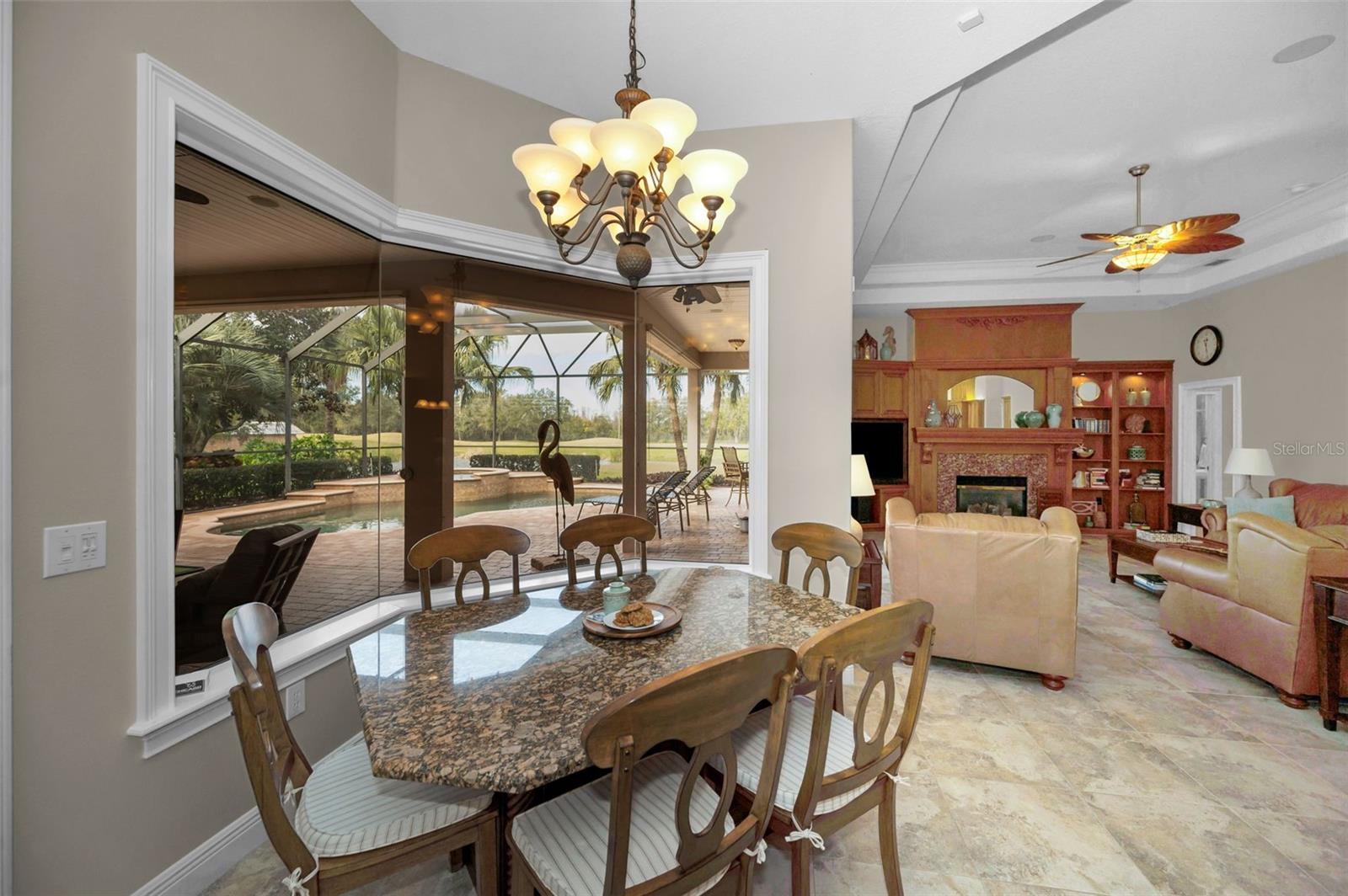 Kitchen table overlooking pool and golf course