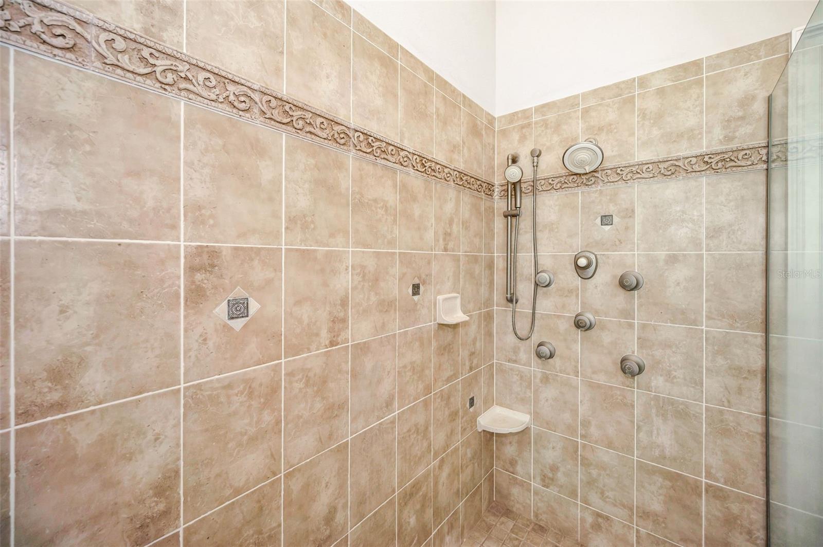 multiple shower heads in primary bathroom