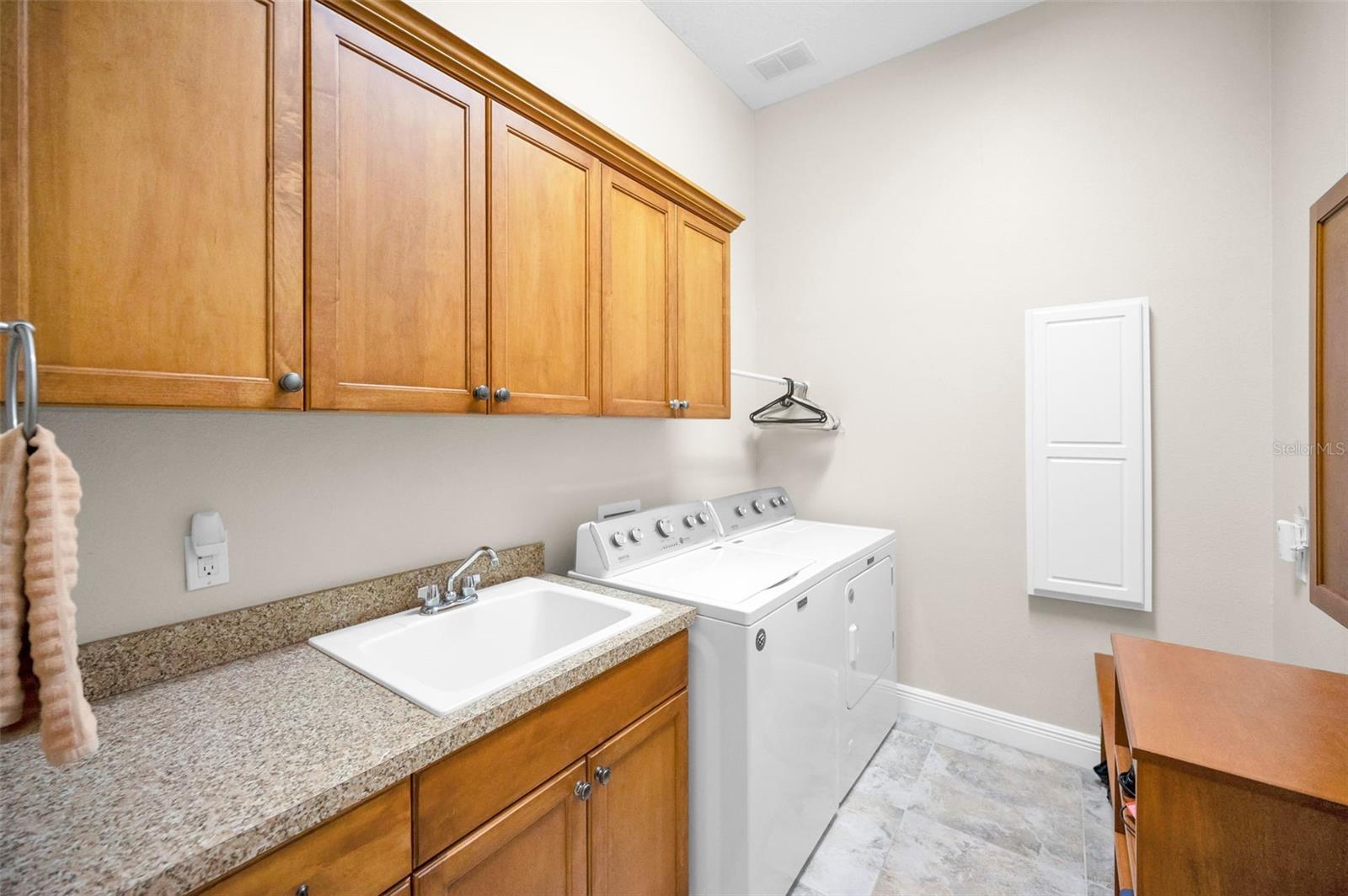 Laundry Room with sink and storage