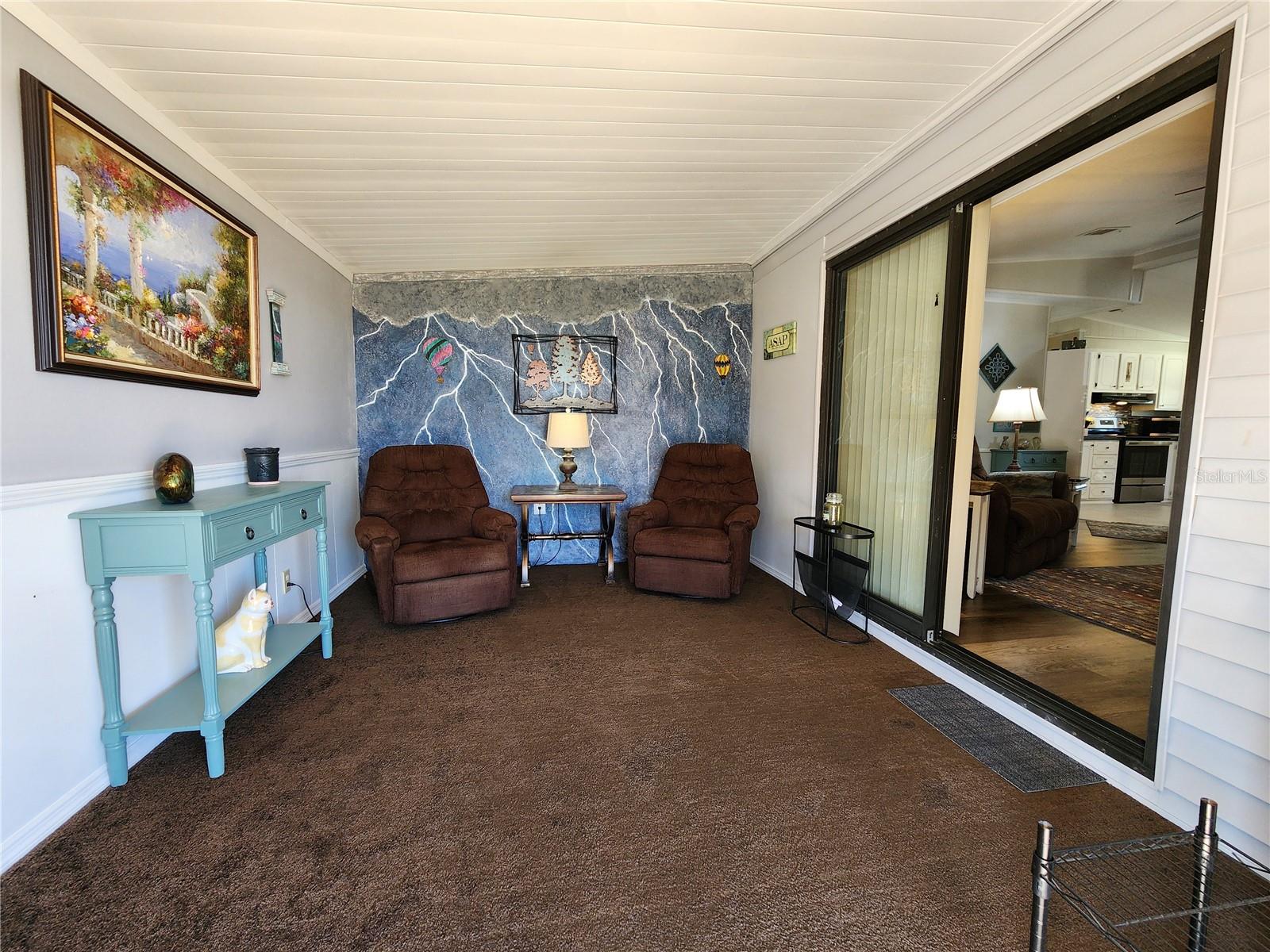 Florida room & sliding glass door to Living room.