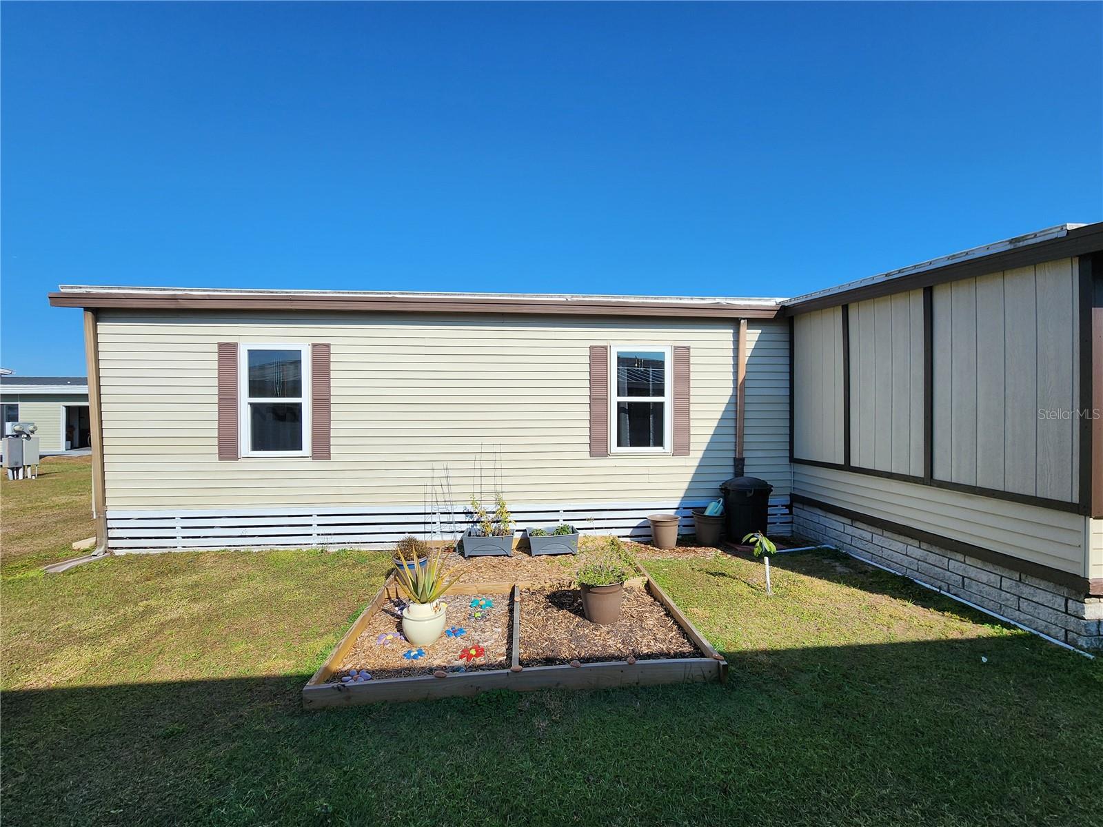 South side of home & Garden bed.