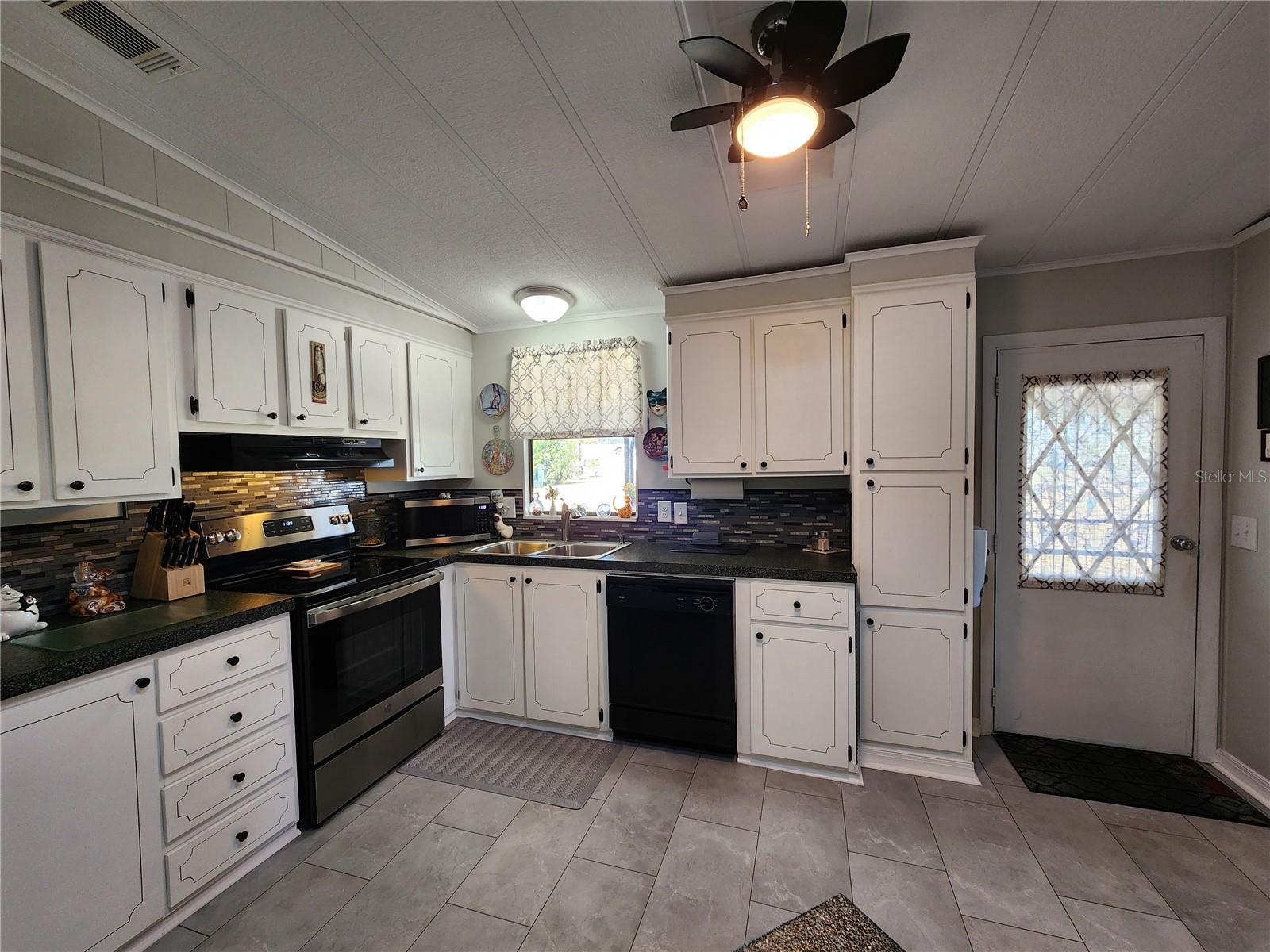 Kitchen with updated appliances.