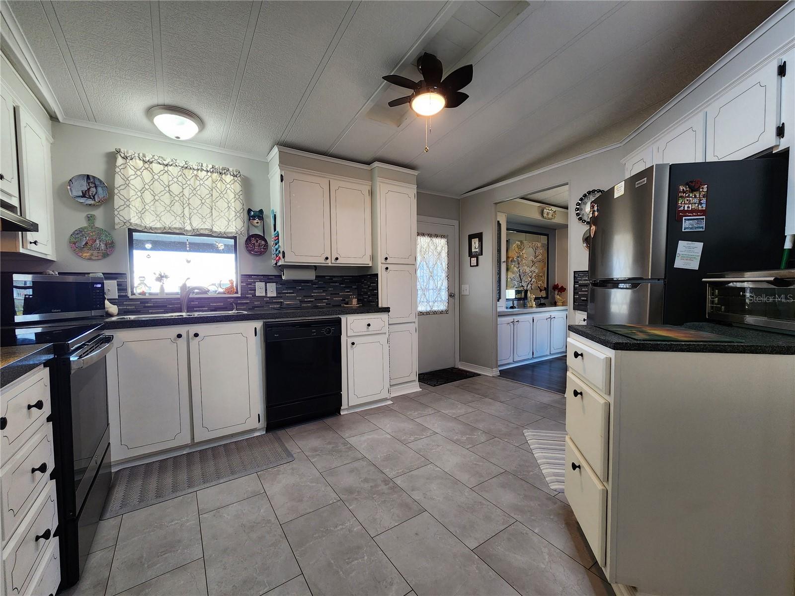 Kitchen with updated appliances.