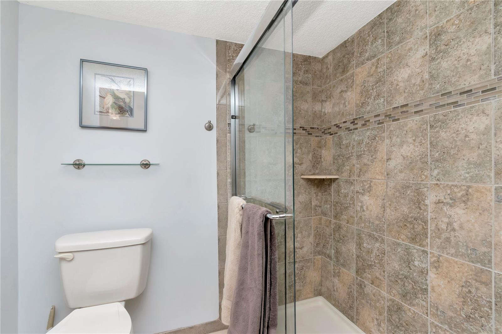 MAIN BATHROOM WITH CUSTOM TILE WALK IN SHOWER