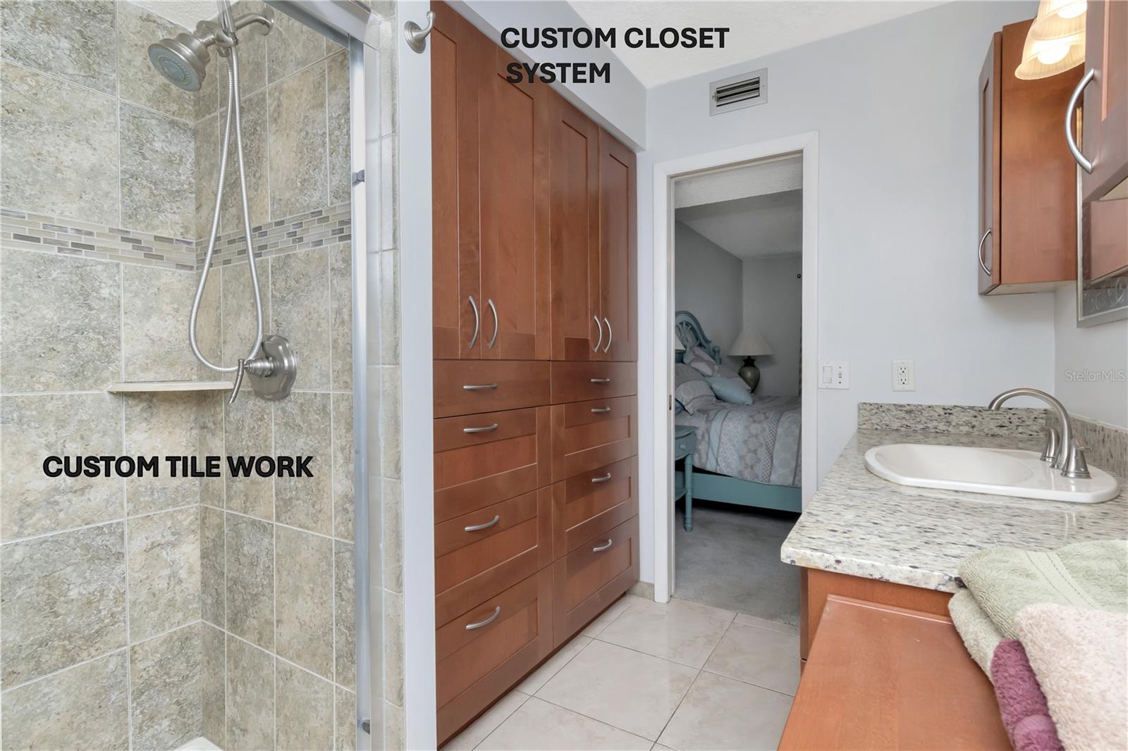 CUSTOM BUILT CLOSET SYSTEM IN MAIN BATHROOM