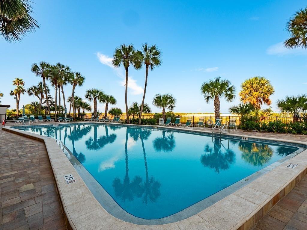 Heated pool directly on beach.