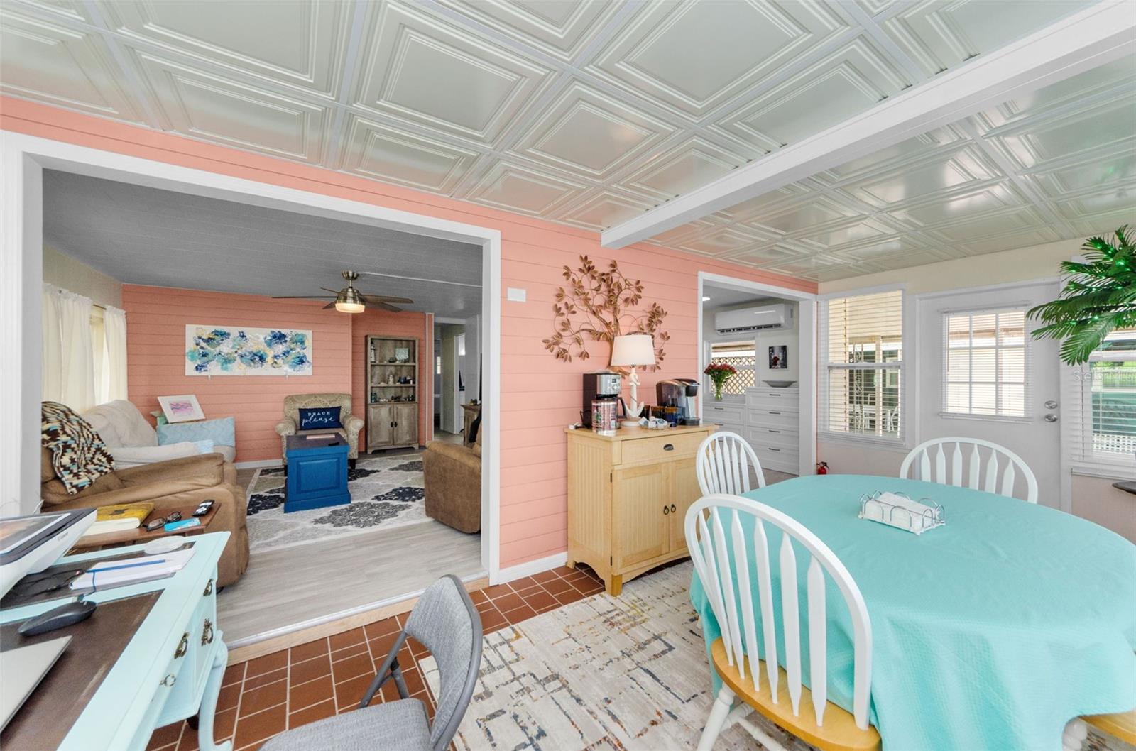 Sunroom access from living room and kitchen and entry way.