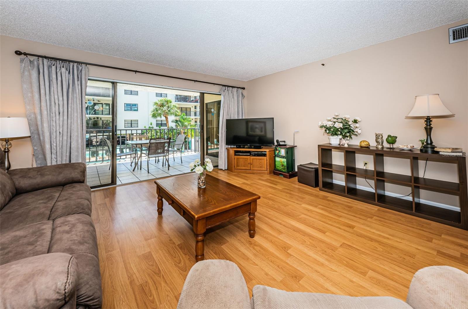 Living Area with sliding glass doors to the balcony