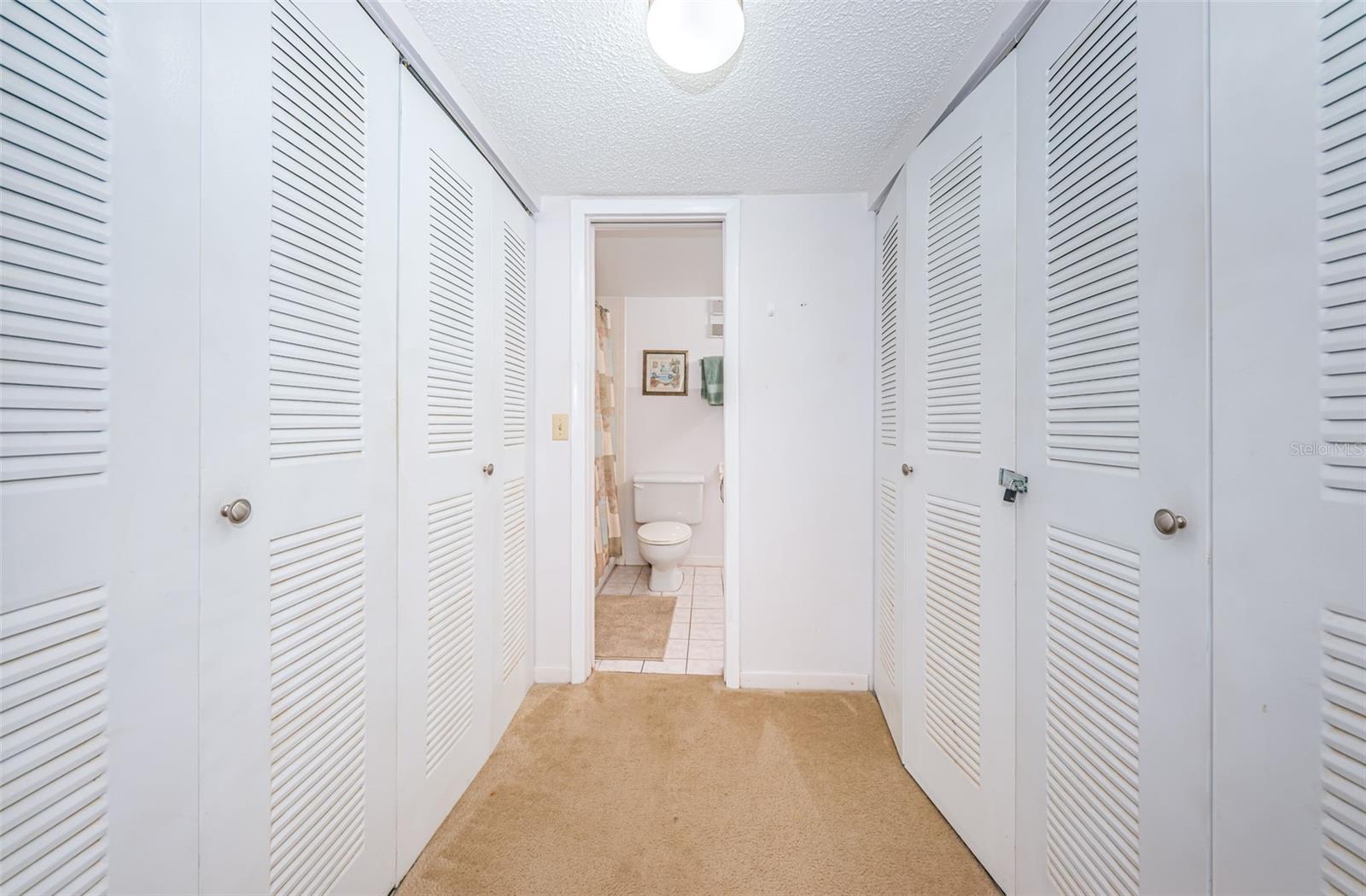 Primary Bedroom Walk-in Closets