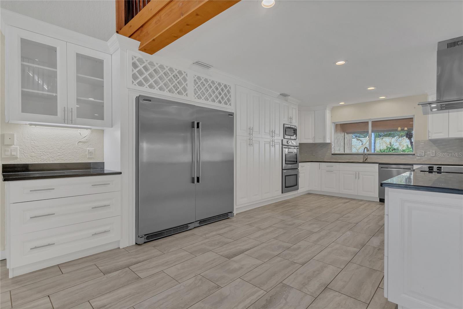 The beautifully remodeled kitchen - look at that fridge!