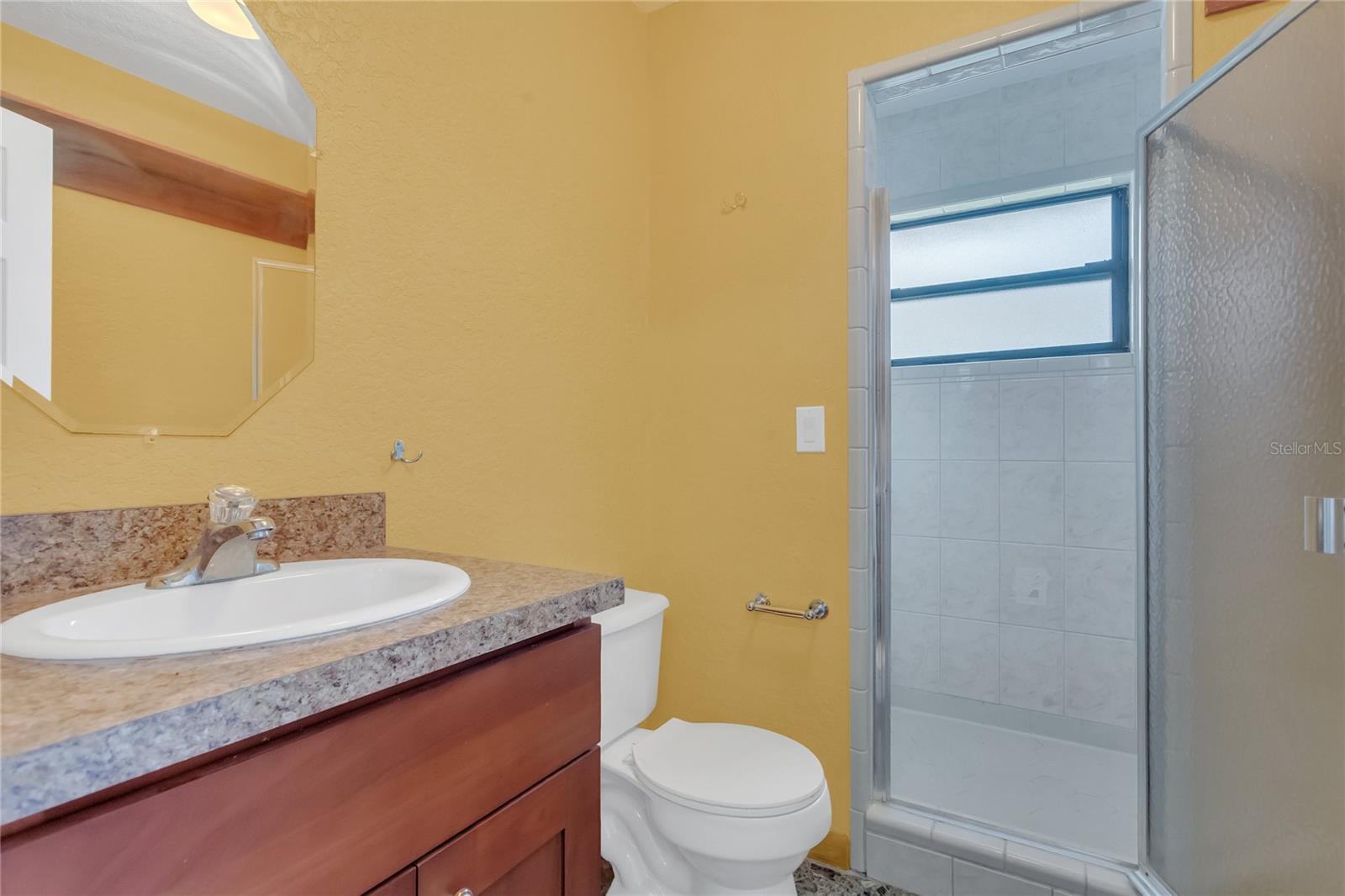 Full bathroom in the laundry room - with a shower