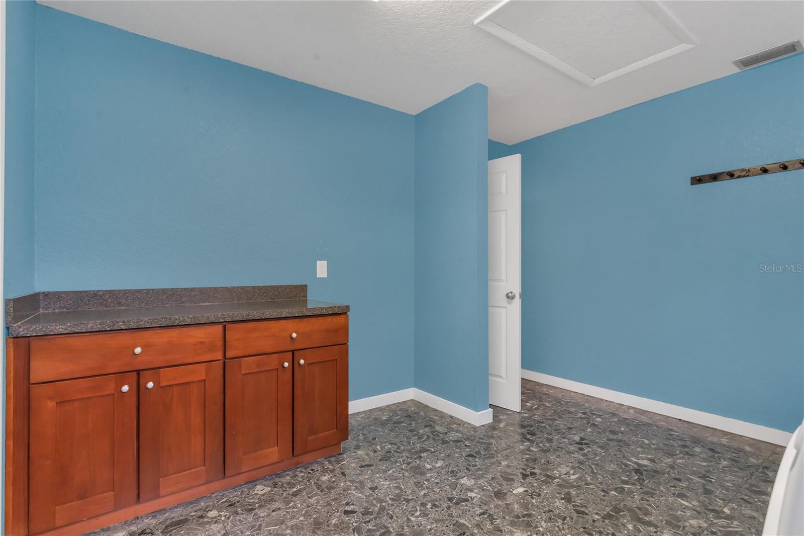 Plenty of space to fold clothes in the laundry room!