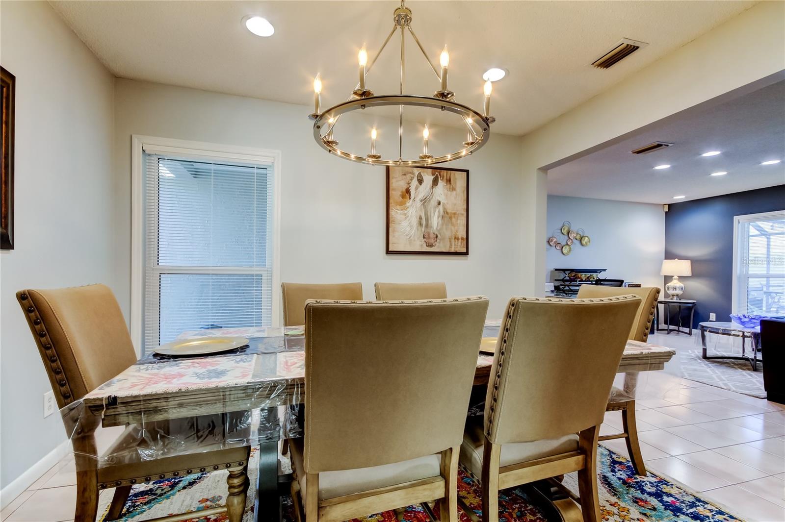 31. Dining Room (10.2' x 11.8') Features Classic Chandelier, Window to Front Yard, Wine Fridge - Which Conveys w Sale!