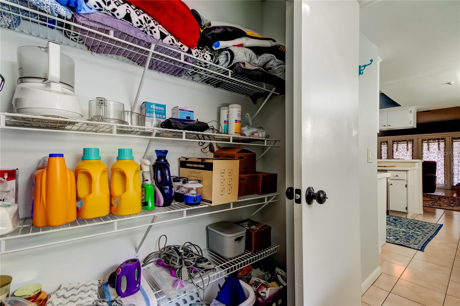 41a. Laundry Area Offers a HUGE Storage Closet to Use as You Wish! There is a Pantry Closet in the Kitchen.. so Store Kitchen Appliances in this Larger Closet!