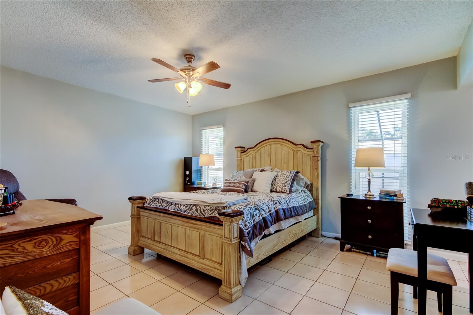 49. Primary Bedroom (16.8' x 13') is Super Spacious! Offering Dual Windows & Ceiling Fan!