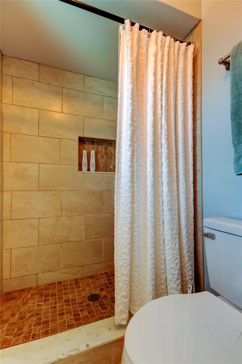 54. Primary Bath Offers Private Water Closet & Shower (5.5' x 4.9').. Separate Vanity is a Great Convenience for a Couple!