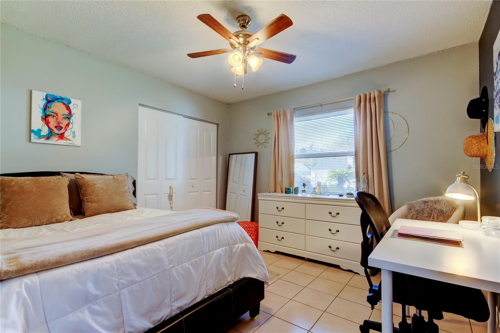 58. Bedroom #3 (11.9' 11.4') is Spacious tooo! Front Facing Light, Full Size Closet, & Ceiling Fan!