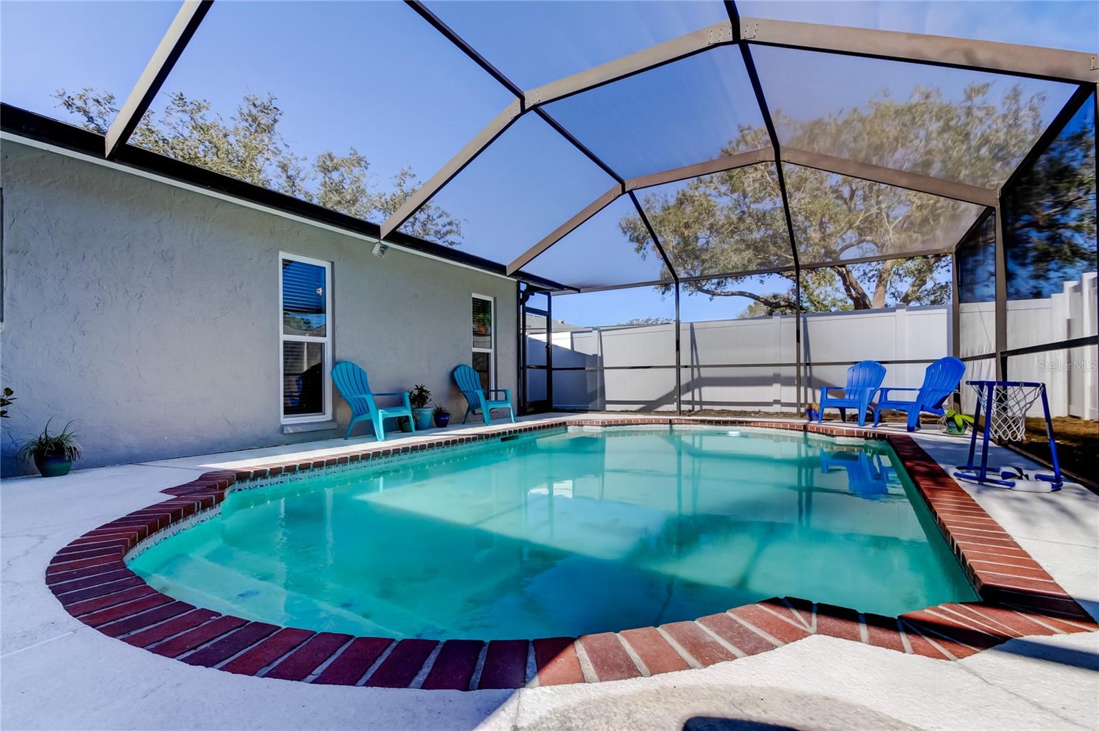 67. Inground Concrete Pool w/ Freshly Rescreened Birdcaged Topper (34.10' x 22.9') Offers Room in Each Corner for Seating Arrangements!