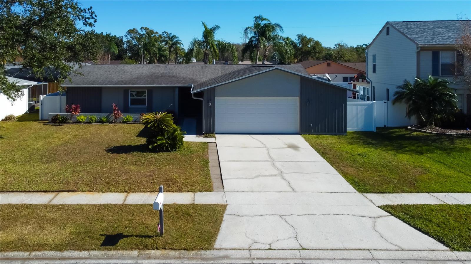 10. 2-Car Garage w NEW Impact Rated Garage Door.. & Nice Large n Long 2-Car Wide, 2+ Car Long Driveway!