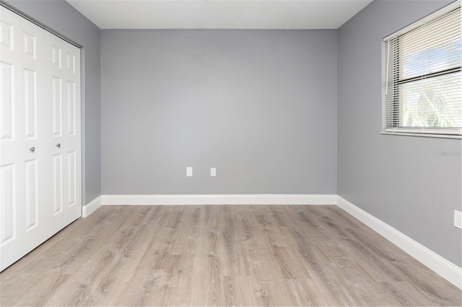 Guest bedroom with a built in closet