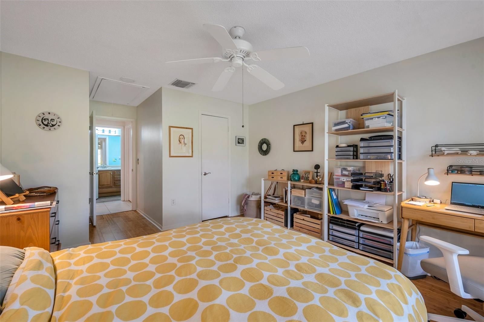 The bedroom features a walk in closet and a closet