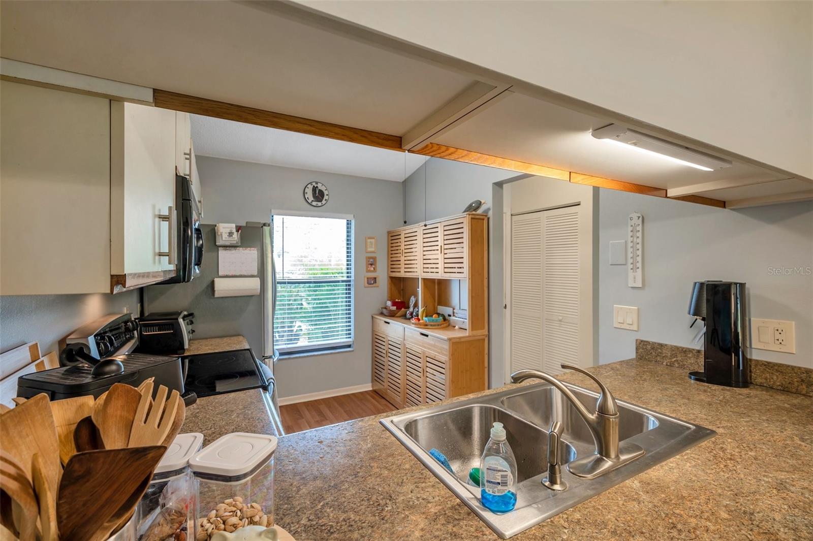 View of kitchen from dining area