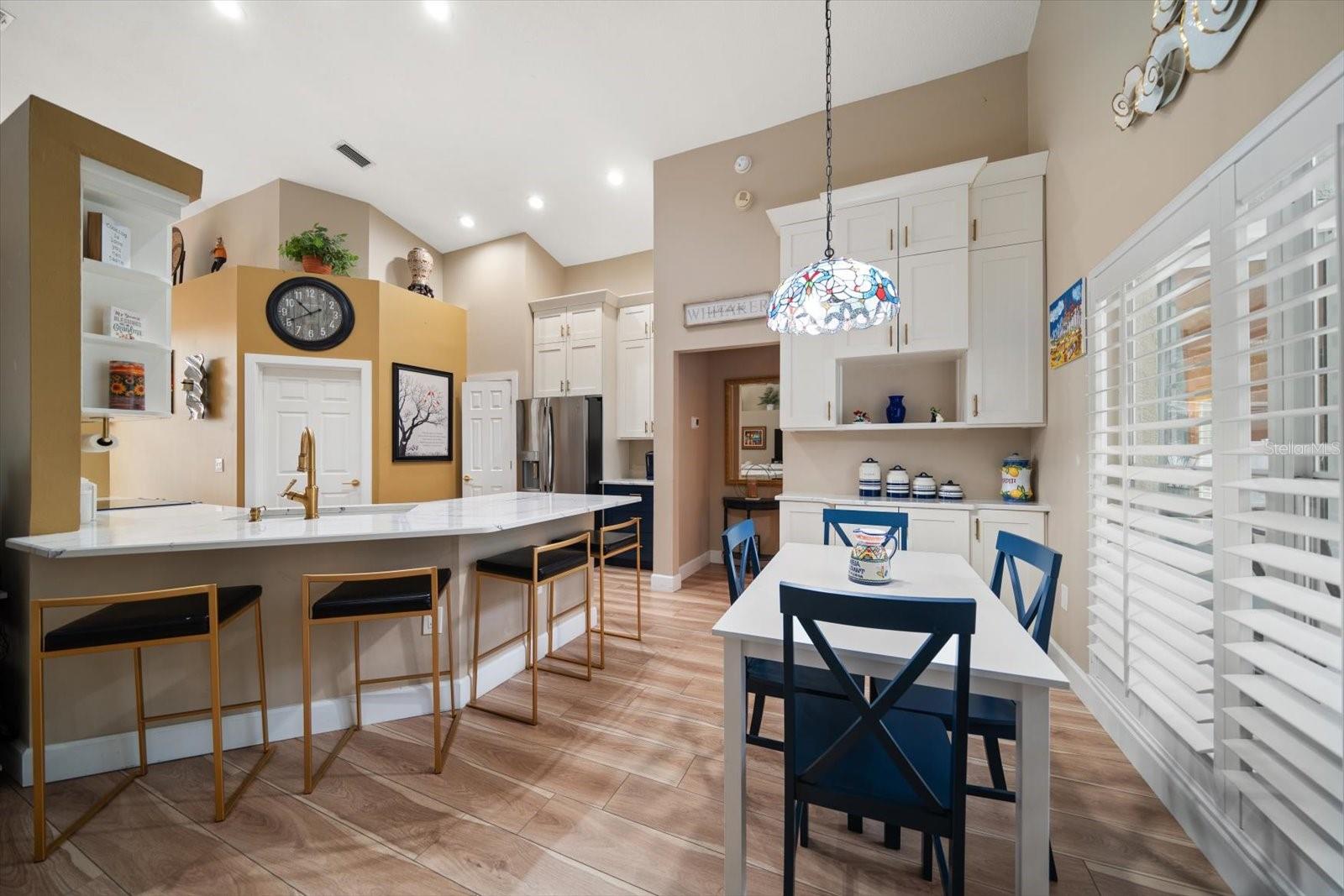 Breakfast bar and eat-in-kitchen area