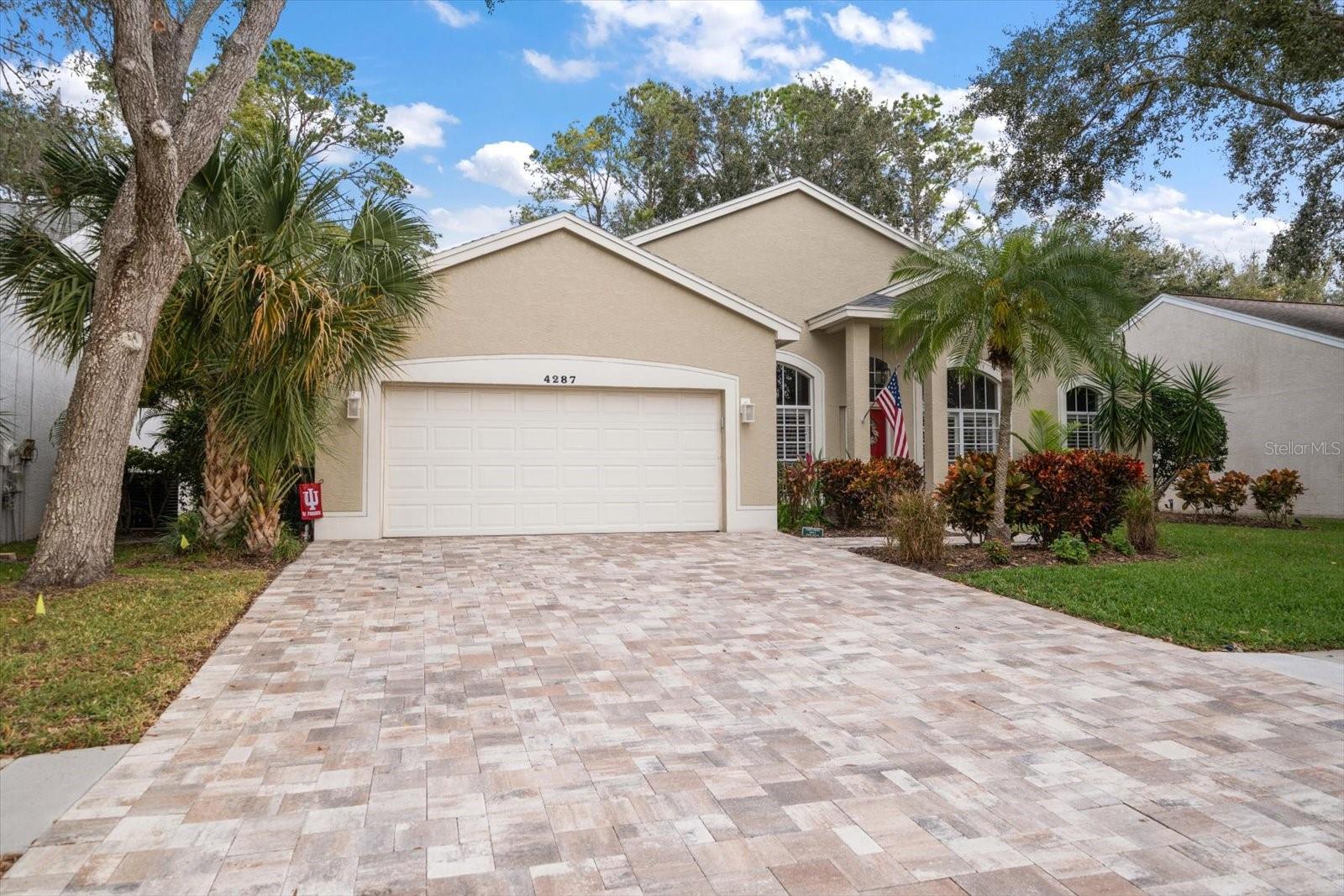 Paver driveway with 2 car garage